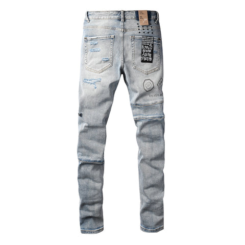 Purple Jeans Edgy Streetwear Men’s Light Blue Ripped Skinny Jeans with Futuristic Symbol Graphic Patches and Heavy Distressing 3048