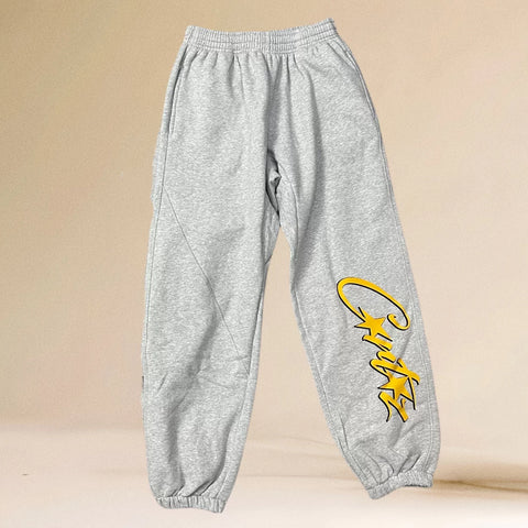 Corteiz Yellow Script Logo Heavyweight Sweatpants grey